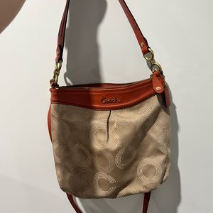 Tan with orange trim coach satchel